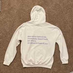 unisex white hoodie with blue writing on back (size medium)